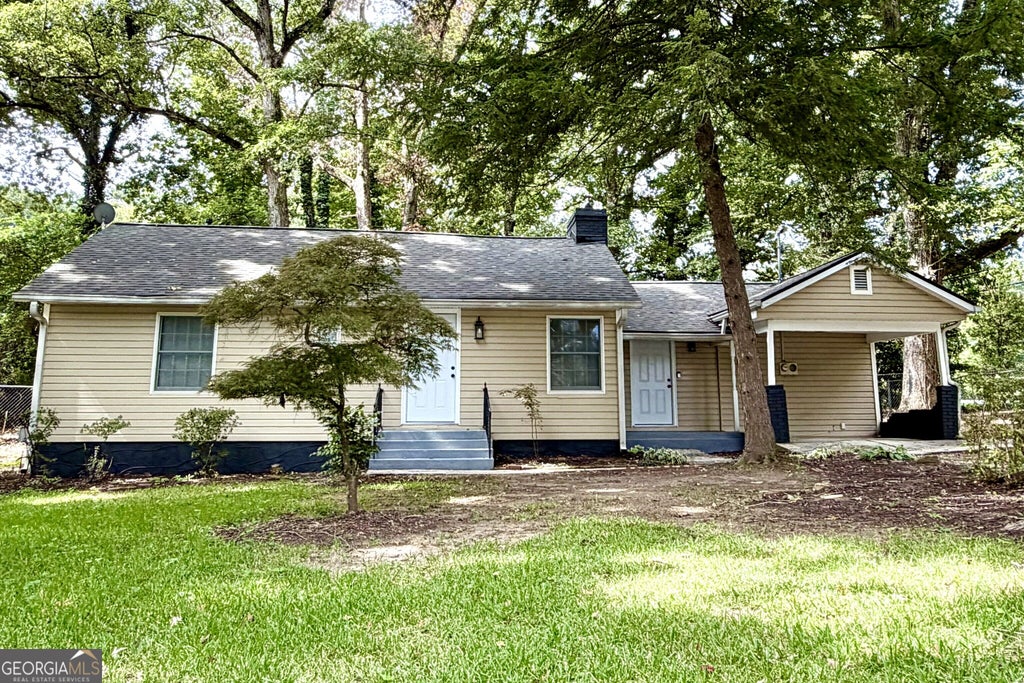 Photo of 1268 Woodland Road NE, Conyers, GA 30012 (MLS # 10867115)