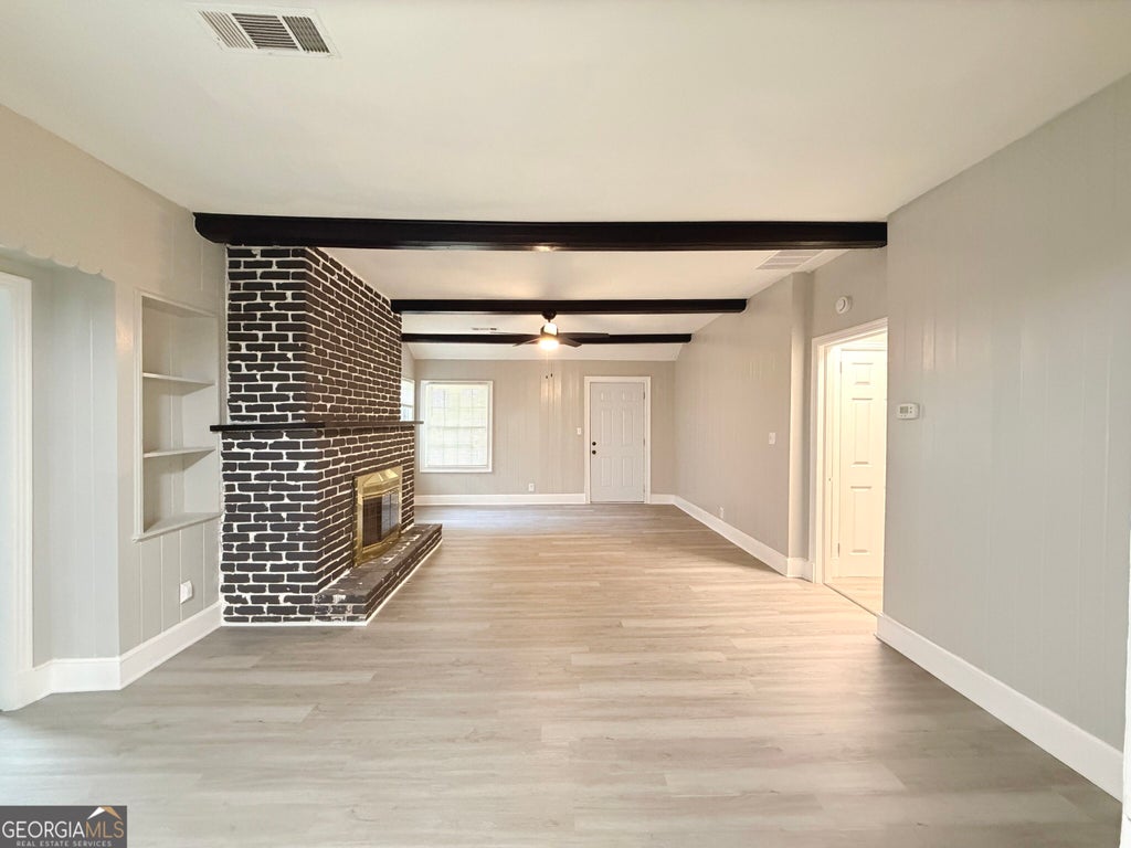 Photo of 1268 Woodland Road NE, Conyers, GA 30012 (MLS # 10867115)