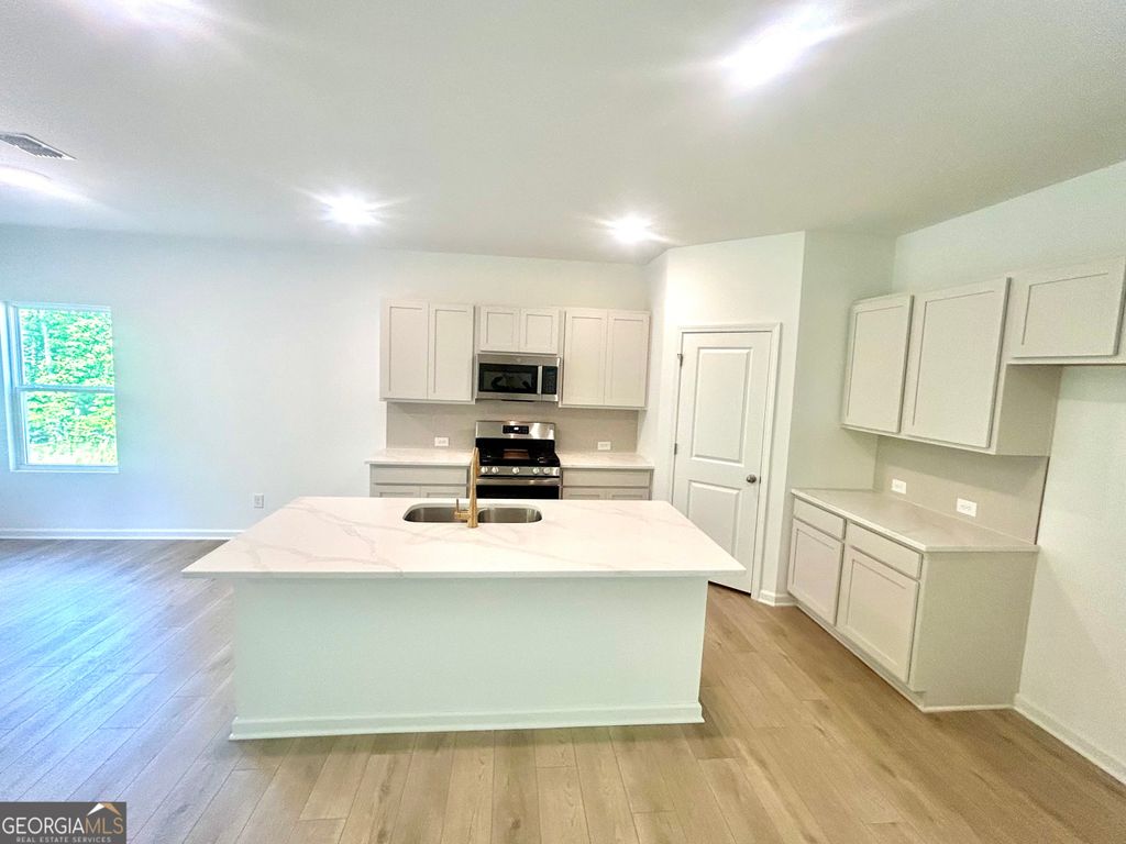 Photo of 5368 Heron Bay Boulevard, Locust Grove, GA 30248 (MLS # 10738789)