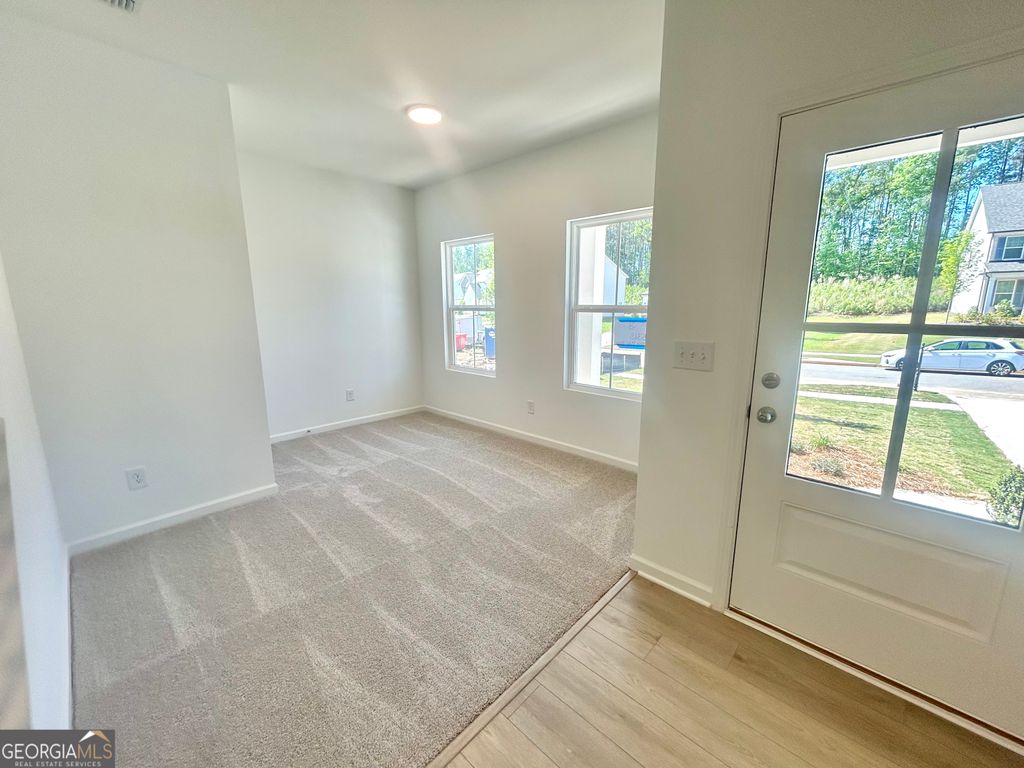 Photo of 5368 Heron Bay Boulevard, Locust Grove, GA 30248 (MLS # 10738789)