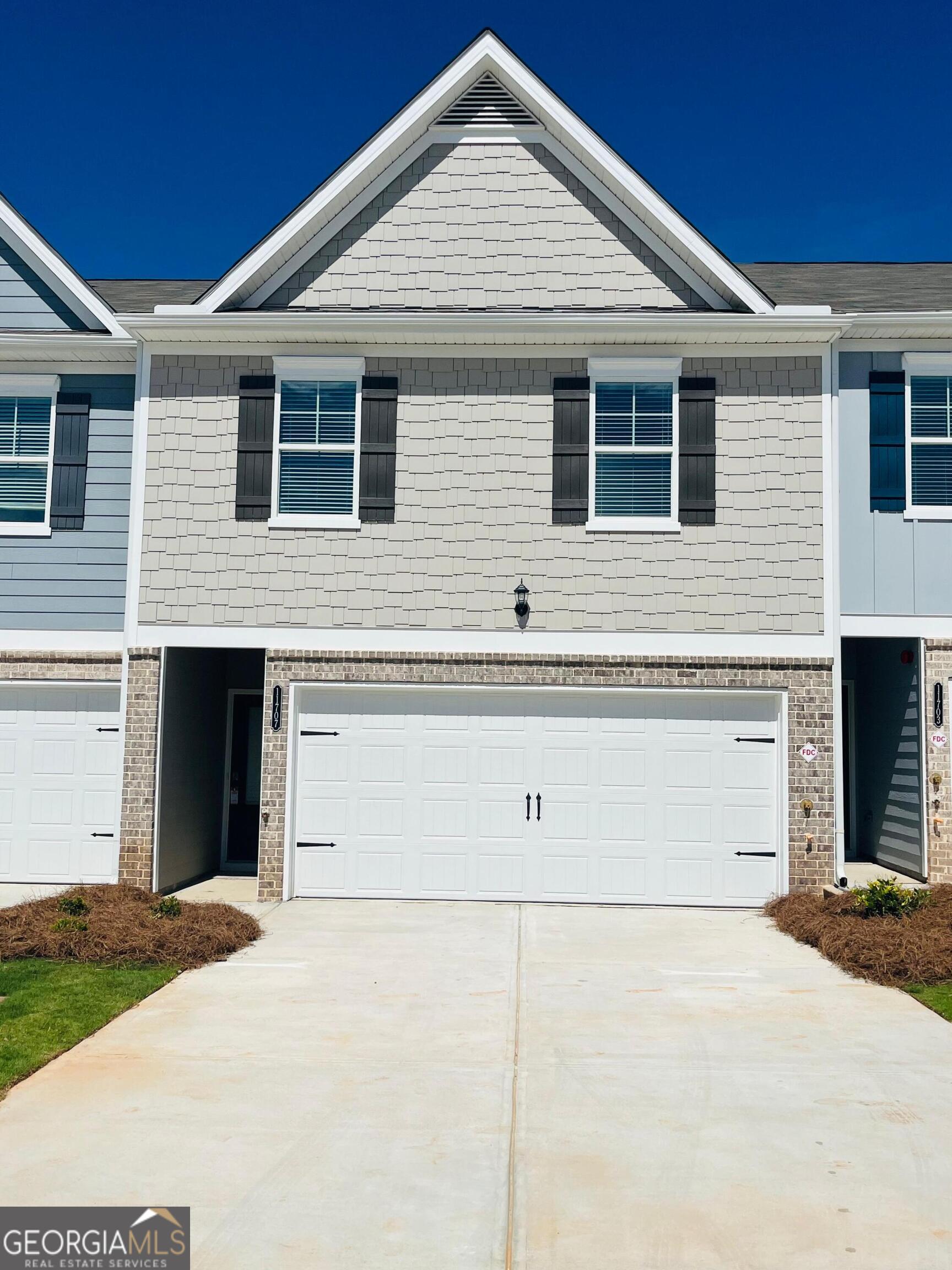 Welcome to this beautiful home located at 11707 Chatham Dr in Hampton, GA. Modern 2024 Townhouse in Secure Community. Discover the perfect blend of style, comfort, and security in this brand-new 2024-built townhouse. Designed for modern living, it features a spacious open-concept floor plan that seamlessly connects your living, dining, and kitchen areas for entertaining or relaxing in comfort. Enjoy the convenience of a two-car enclosed garage, providing both protection for your vehicles and extra storage space. Located in a secure, gated community, you'll have peace of mind knowing your home is in a safe and private environment. Highlights: Built in 2024 - pristine, new condition. Open-concept layout with abundant natural light. Two-car enclosed garage with direct access to your home. Gated entry Centrally located close to shopping and entertainment Excellent school district