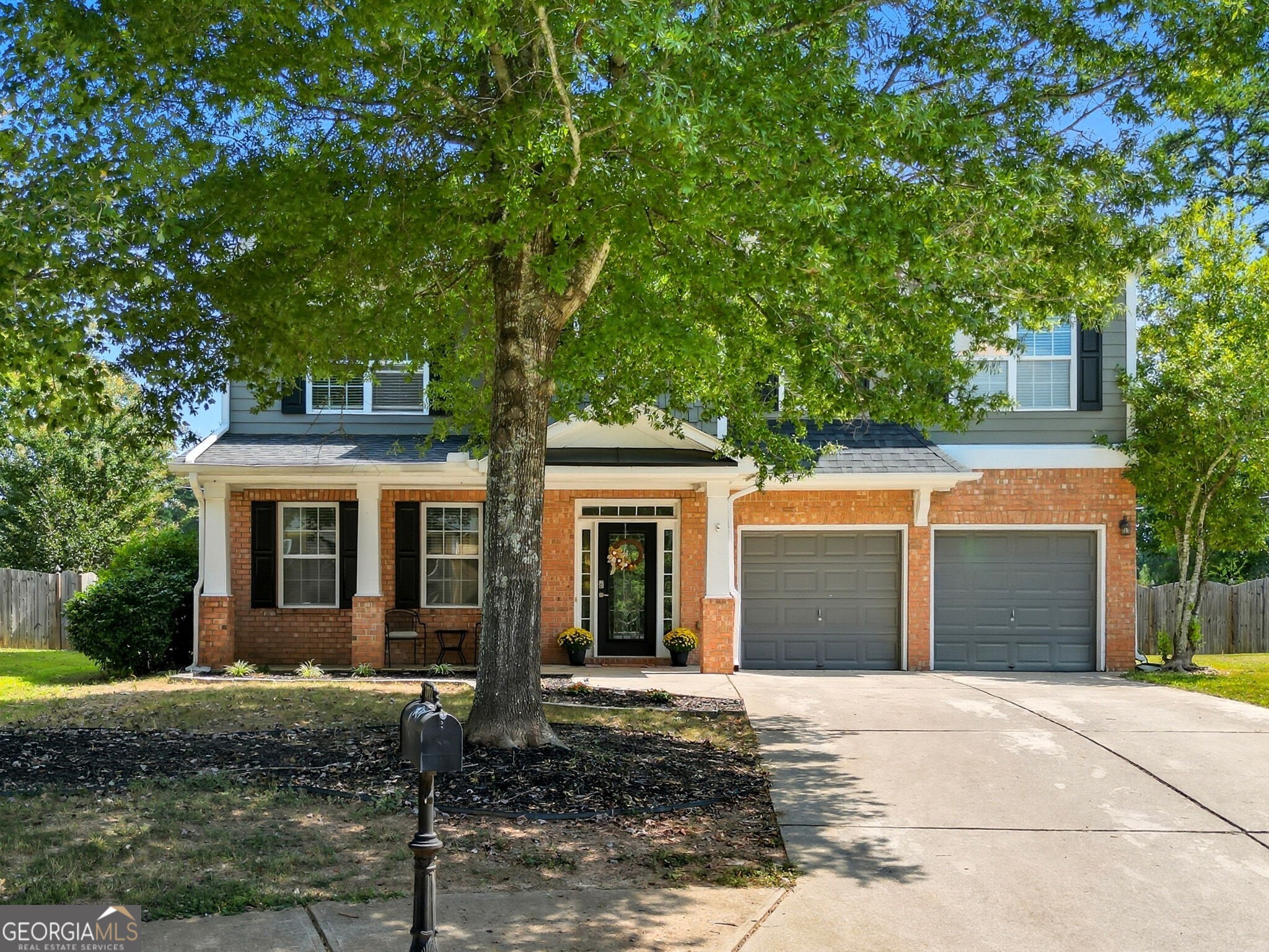 Well-maintained two-story brick-front home located in a desirable Kennesaw neighborhood. This property features 4 bedrooms and 2.5 bathrooms and a versatile loft upstairs. The updated kitchen includes stainless steel appliances, a gas cooktop with vent hood, ample cabinetry, under-cabinet lighting, and tiled backsplash. Spacious living and dining areas offer flexibility for everyday living and entertaining. A large primary suite features an updated ensuite bathroom, sitting area and large walk-in closet. Laundry upstairs adds to the convenience of this open floor plan. The home is flooded with abundant natural light and features a large fenced in backyard with storage. Exterior highlights include a covered front porch, landscaped yard, and a two-car garage with flat, extended driveway. Conveniently located near schools, parks, shopping, and dining.