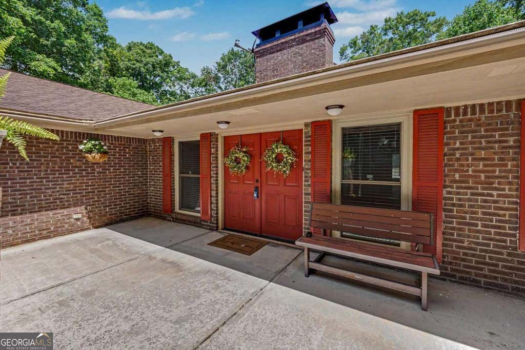 Photo of 124 Shadow Lake Drive SW, Lilburn, GA 30047 (MLS # 10781434)