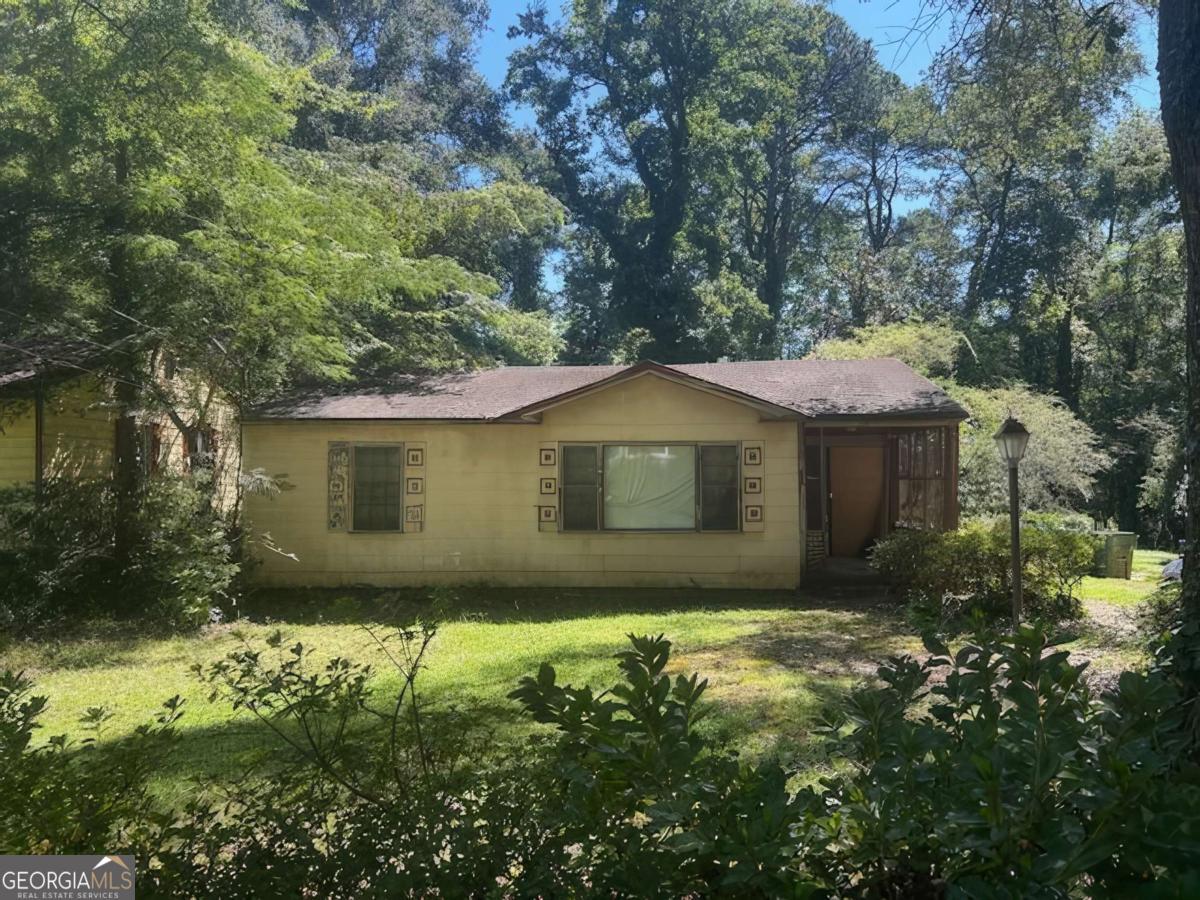 Welcome to 1075 Cato Street! The home is priced it to sell, and it's a great opportunity for an investor or handy buyer looking for a fixer-upper. Don't miss out on this diamond in the rough! Property features 3 bedrooms, 1 bathroom, and a large lot to build up or back. Located in a vibrant area where many homes are being or have been renovated, surrounded by exciting new developments and amenities that enhance its appeal. Proximity to Westside Park: Enjoy outdoor activities and scenic walks in Atlanta's largest green space. Dining and Entertainment: A short drive to popular spots like The Works, a mixed-use development offering dining, shopping, and entertainment options. Convenient Access to Major Highways: Easy access to I-75 and I-285, making commutes to downtown Atlanta and other areas a breeze. Close to the Elementary School. Public Transportation: Nearby MARTA stations provide convenient travel options throughout the city. Investment Opportunity: This property is ideal for investors looking to capitalize on the growing demand in this area. With numerous renovations occurring in the neighborhood, the potential for increased property values is significant. Sold AS-IS!