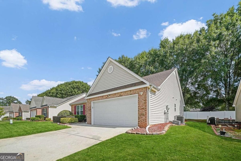 Photo of 504 Mockingbird Lane, Loganville, GA 30052 (MLS # 10854673)
