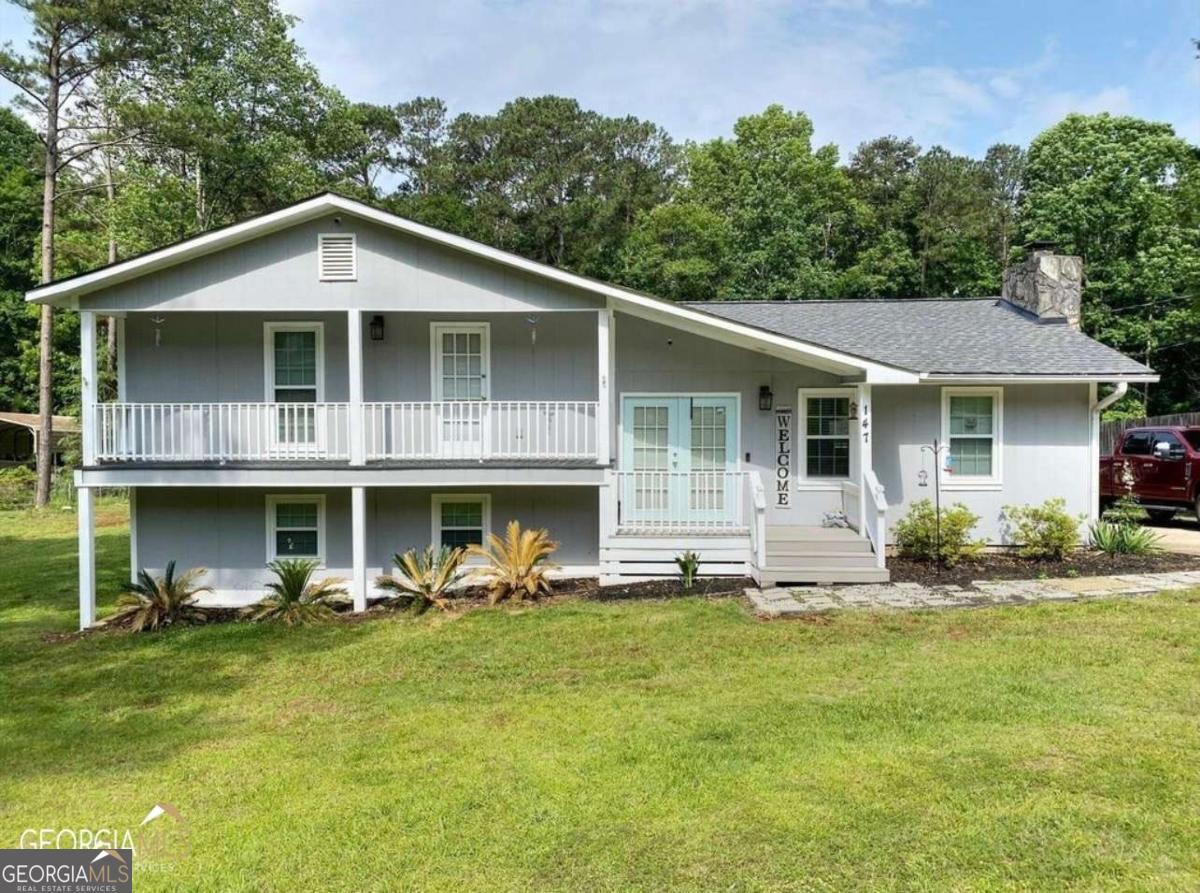 Welcome home to this updated 3 bedroom, 3 bathroom home located on West Point Lake in Lagrange! This home features an open floor plan, beautiful LVP floors, granite countertops, a full equipped kitchen and so much more! Upstairs you will find all 3 bedrooms and 2 full renovated bathrooms. 1 of the bedrooms have access to a balcony on the front of the house! Downstairs you will find a large flex room or optional 4 bedrooms along with another full bathroom! Enjoy your morning coffee on the large private deck that overlooks a spacious backyard. Tenants also have access to a full 2 car garage with large roll up doors and a separate carport! This one won't last long! Must see!