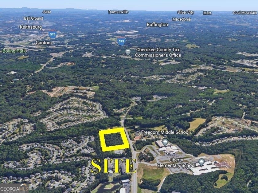 10.70+/- ACRES ON BELLS FERRY ROAD. PROPERTY HAS MIXED ZONING IN PLACE.PART IS ZONED NC AND THE REMAINDER IS ZONED O&I. LOCATED IN FRONT OF ONE OF CHEROKEE COUNTIES MOST PRESTIGIOUS SUBDIVISIONS BRIDGE MILL GOLF & COUNTRY CLUB. PROPERTY HAS FRONTAGE OF 850 FEET AND LOCATED BESIDE BARNETT PARK AND ACROSS FROM ELEMENTARY AND MIDDLE SCHOOL. TONS OF RESIDENTIAL LIVING IN THE IMMEDIATE AREA TO VARIOUS COMMERCIAL USES THIS PROPERTY IS INTENDED FOR. ALL UTILITIES ARE AVAILABLE TO SITE. APPROVED ZONING FOR COMMERCIAL AND OFFICE USES MAKES THIS SITE READY FOR DEVELOPMENT. BROKER HAS ZONING RESOLUTION WITH CONDITIONS AVAILABLE. SITE IS APPROVED FOR DOLLAR STORES, RETAIL STORES, COMMON MERCHANDISE,VETERINARY CLINIC, HEALTH CLUBS. PLEASE CALL WITH ANY QUESTIONS.