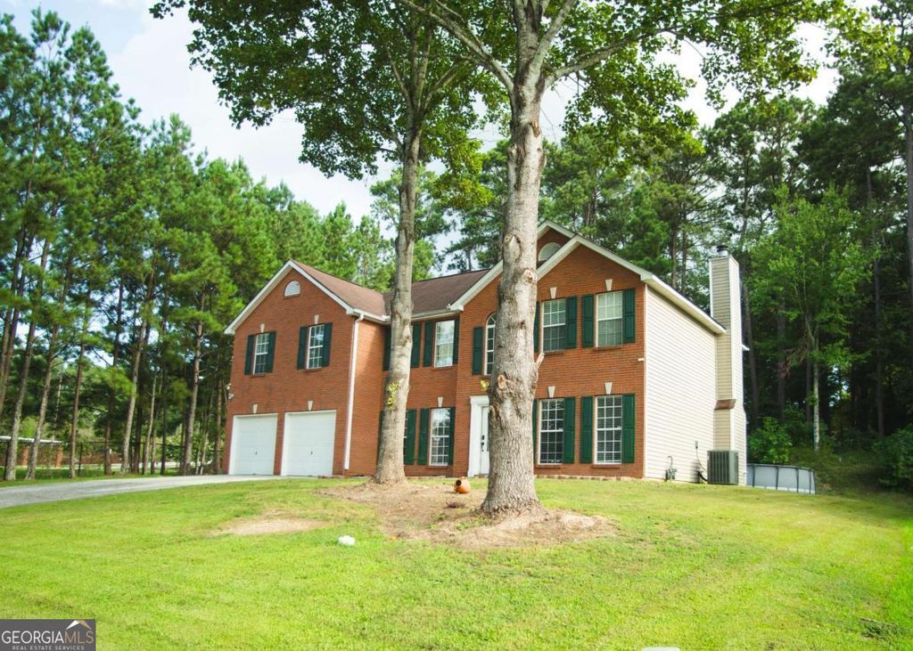 Photo of 6701 Wehunt Way, Lithonia, GA 30058 (MLS # 10669868)
