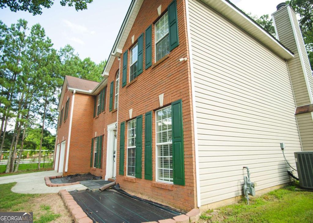 Photo of 6701 Wehunt Way, Lithonia, GA 30058 (MLS # 10669868)