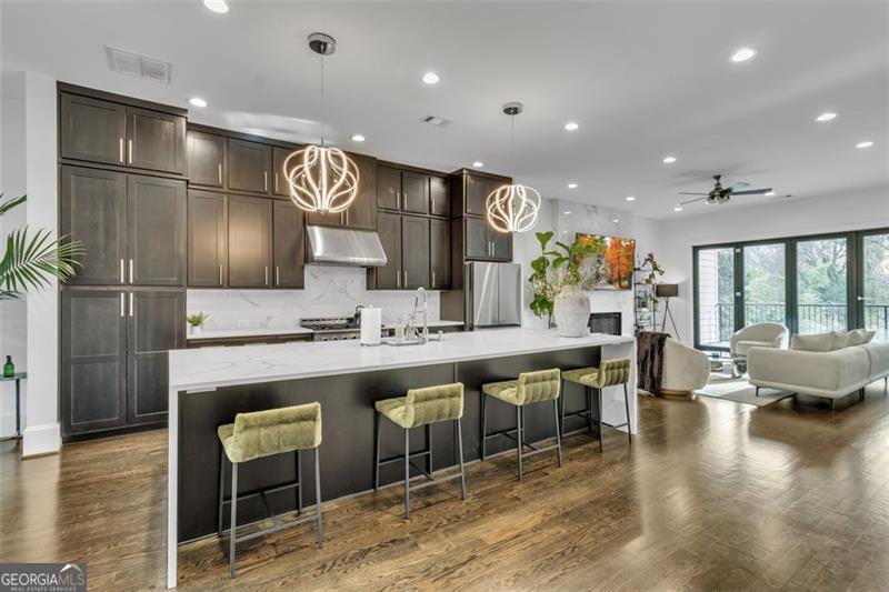 lcome to Briar Cove, an exclusive boutique community offering just 19 luxurious townhomes in one of Atlanta's most coveted locations. Perfectly positioned near Emory University, the CDC, and prestigious neighborhoods like Buckhead, Decatur, Virginia-Highland, and Midtown, Briar Cove provides unparalleled access to scenic walking trails around Emory/Candler Lake, Herbert Taylor Park, and Morningside Nature Preserve. Effortless commuting is guaranteed with quick access to I-85 and GA-400. This home in Briar Cove is a masterpiece of design, bathed in natural light and adorned with opulent finishes. Equipped with an expansive open-concept layout that's perfect for both entertaining and everyday living. The gourmet kitchen, the centerpiece of the home, features a stunning 12-foot waterfall quartz island and European-style accordion glass doors, opening to a private, covered deck equipped with a gas line for seamless outdoor grilling. This home is also elevator-ready for ultimate convenience. The primary suite is a sanctuary of luxury, boasting an all-marble bathroom, dual walk-in closets, a soaking tub, and a spacious walk-in shower. Additional highlights include soaring 10-foot ceilings and 8-foot doors on the main and upper levels, wide hallways, and a two-car garage with ample storage and guest parking. For pet lovers, Briar Cove offers a dedicated dog park, and the home includes its own fenced green space. This is the epitome of luxury living in the heart of Atlanta, where convenience meets exceptional design. As an added bonus, a brand-new Lifetime Fitness and Children's Hospital just opened nearby, adding even more value to this prestigious community.