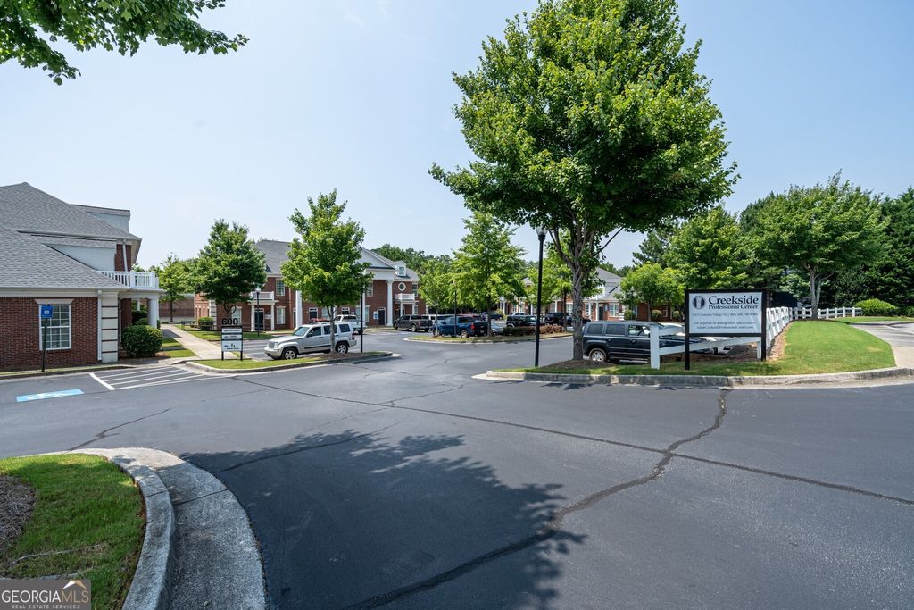 Photo of 3105 Creekside Village #605, Kennesaw, GA 30144 (MLS # 10681430)