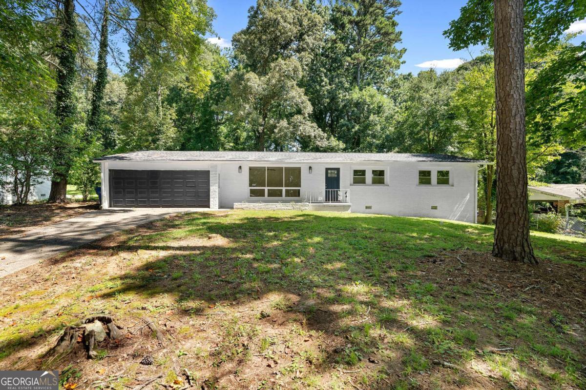 Rare Find in Atlanta's West End Why wait? Step inside this newly renovated 3-bedroom gem where designer style meets everyday convenience...at a price you haven't seen before! Here's what makes this home impossible to ignore: Bright, brand new kitchen featuring high-end quartz countertops, stainless steel appliances and modern cabinetry-designed to impress. Gleaming hardwood floors throughout -zero carpet, zero hassle, no allergies! A smart renovation which included adding an en-suite bath to the primary bedroom - a feature buyers beg for. A rare 2-car attached garage - skip street parking forever and getting wet in the rain! Large sliding doors from the eating area lead to the spacious, level backyard perfect for entertaining, kids, fur babies, BBQ's or lounging with large storage shed to boot - ideal for hobbies, storage, lawn equipment, shop or whatever you need. Full laundry/mud room from the garage to the kitchen. This home lives larger than the square footage on paper with a smart layout that feels open, airy, and comfortable All this on a big lot in the highly sought- after West End - close to BeltLine trails, parks, restaurants, and everything downtown Atlanta. New to the market again with a fresh price and serious seller. Taxes do not reflect homestead exemption. Bonus - ask how you can get your appraisal fee credited back in full at closing!