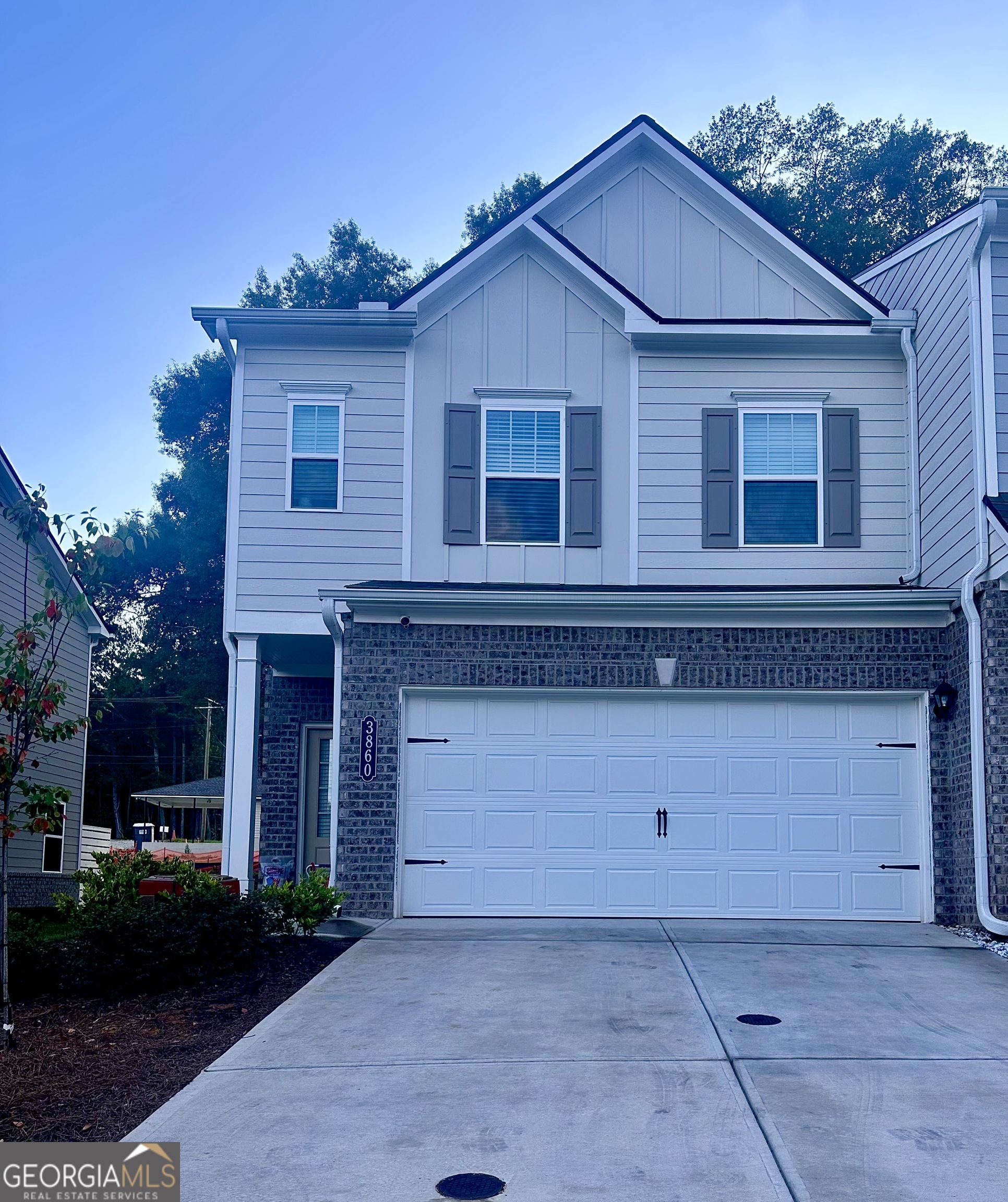 Welcome to this meticulously maintained townhome built in 2025 in sought after Preston Towns in Cobb County. Open concept main floor includes spacious great room with a cozy fireplace, gourmet kitchen with granite countertops, grey cabinets, beautiful backsplash, stainless steel appliances and large island. Off the kitchen is a nice breakfast nook. Upstairs, the primary suite boasts a luxurious ensuite walk-in shower with double vanity, and a generous walk-in closet. Two additional bedrooms and a full bath provide ample space for family or guests, with additional loft space to be used as office or play room. Laundry room is located upstairs for convenience. Enjoy outdoor living in the back yard which can be easily fenced. Don't miss this incredible opportunity? Schedule your showing today!