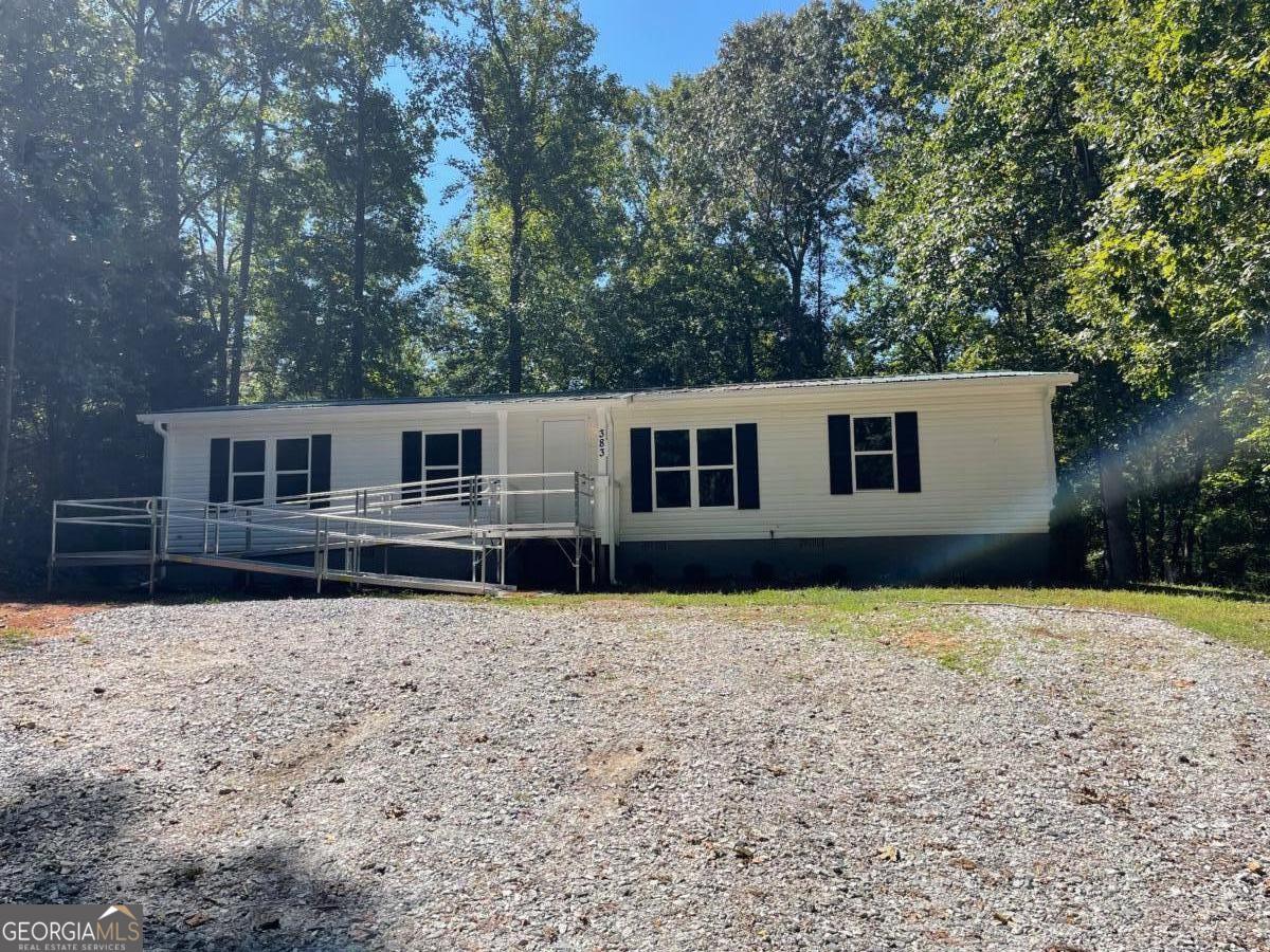 Like new! This completely renovated 3 bed / 2 bath home has an open plan with tons of light. The great room is spacious and will accommodate all your furnishings. The renovated kitchen has new cabinets, quartz countertops and a deep, heavy-duty stainless steel farmhouse sink. Both bathrooms are updated and all the closets are large. There are two very large extra rooms with closets that would be perfect for additional bedrooms or an office, exercise room, etc. There is a substantial ramp to the front entrance, perfect for anyone aging or needing accessibility options. The large back yard is private and a small storage shed is included. This great home is in perfect condition and move-in ready!