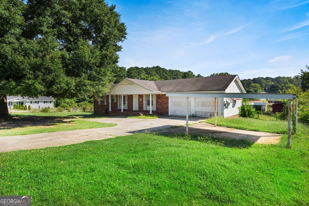 Photo of 4911 Flint Hill Road, Austell, GA 30106 (MLS # 10846705)