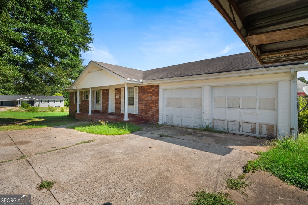 Photo of 4911 Flint Hill Road, Austell, GA 30106 (MLS # 10846705)