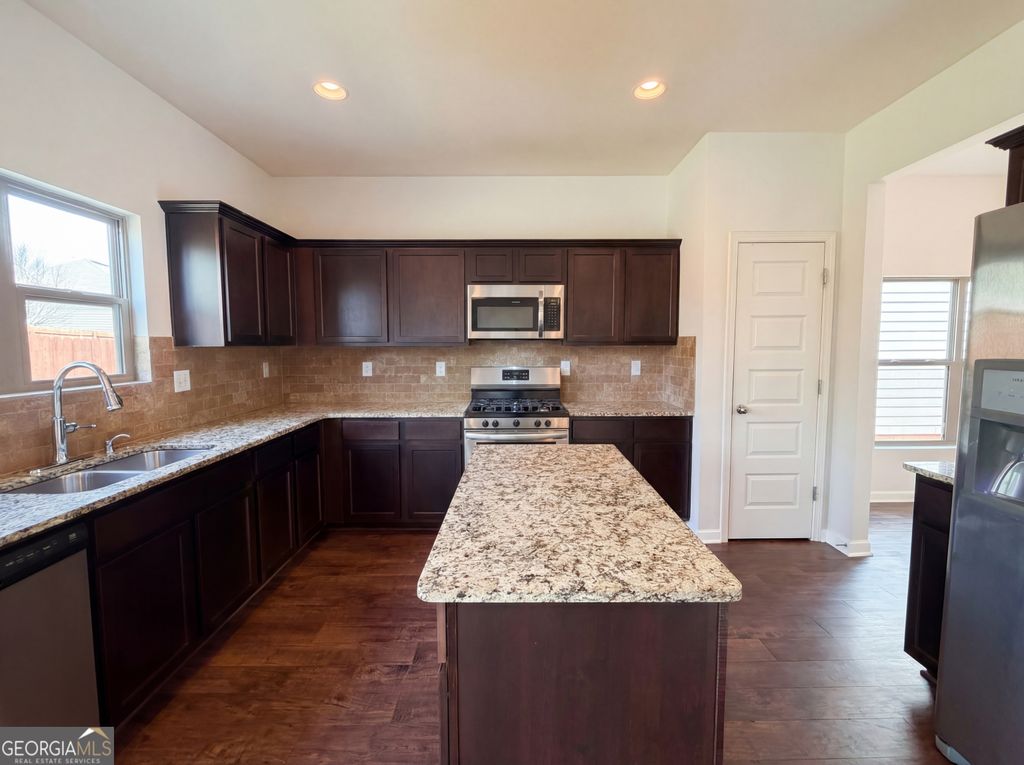 Photo of 564 Emporia Loop, McDonough, GA 30253 (MLS # 10720052)