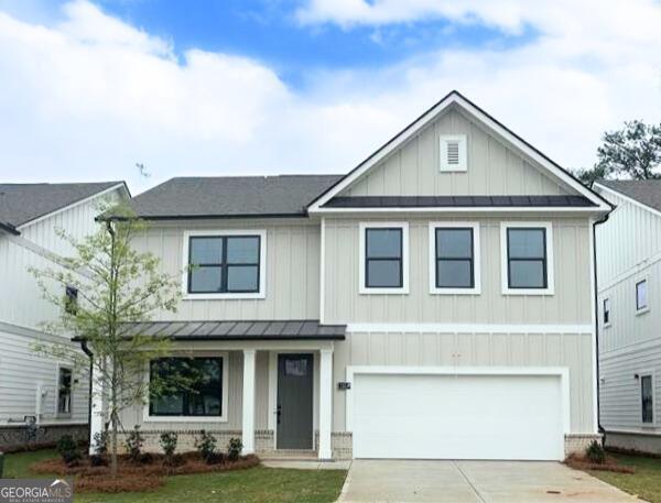 This stunning Hanover floor plan, currently under construction in The Villages at Sandy Plains, offers everything you're looking for in a new home. With 5 bedrooms and 3 baths, this spacious layout includes a bedroom and full bath on the main level, perfect for guests or a home office. The open-concept design features a modern kitchen complete with quartz countertops, exterior ventilated vent hood, a large island overlooking the dining area and living room, making it perfect for entertaining. Upstairs, you'll find four bedrooms, two full baths, laundry, and a versatile loft area. The home boasts luxury interior finishes and comes with D.R. Horton's industry-leading home warranty for added peace of mind. Located in a prime Marietta location, this community offers easy access to top-rated schools, shopping, dining, and major highways. Don't miss your chance to own this beautiful new home.