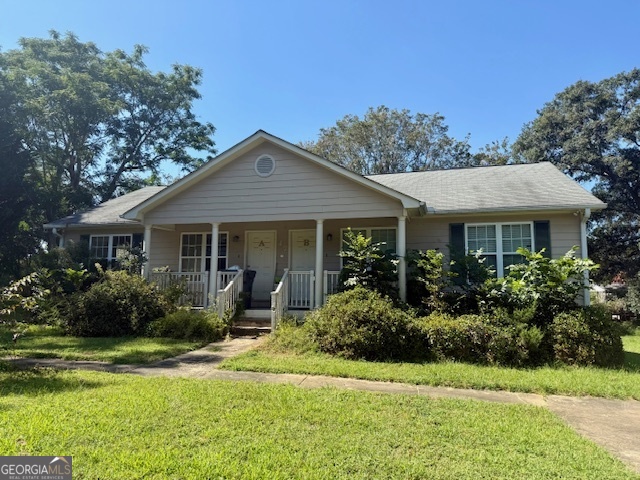 Investment Opportunity in Forsyth!! Duplex- each side is 2 bedroom/1 bath. Needs Flooring replacement. Great Location & potential. SOLD AS IS. Cash or Conventional Financing Only.