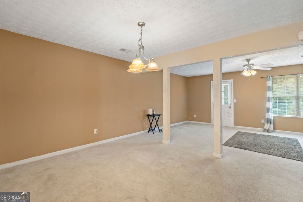 Photo of 8399 Carlington Lane, Jonesboro, GA 30236 (MLS # 10657784)