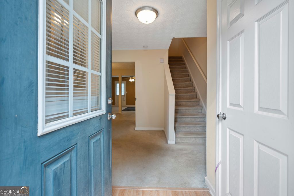 Photo of 8399 Carlington Lane, Jonesboro, GA 30236 (MLS # 10657784)