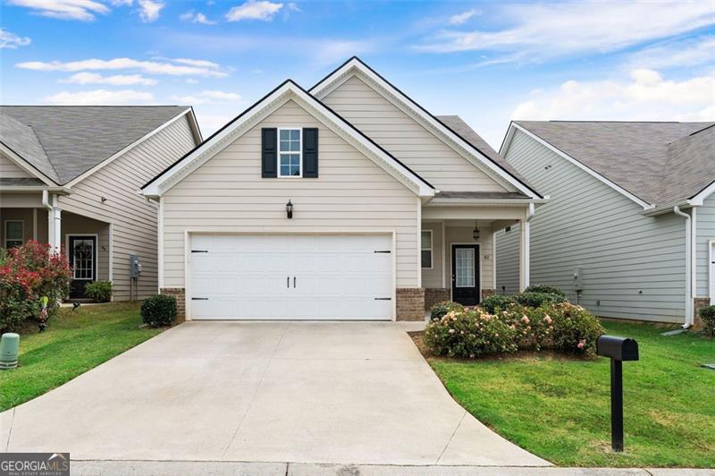 Welcome to The Villages at the Adares in Adairsville! This 3-bedroom, 2-bath home offers the perfect blend of style, convenience, and comfort. Step inside to an open floor plan designed for modern living, with a spacious family area flowing seamlessly into the kitchen and dining spaces. The kitchen features granite countertops, a large kitchen bar ideal for casual dining or entertaining, and plenty of storage. Downstairs, enjoy all-luxury vinyl plank flooring throughout-durable, stylish, and easy to maintain. Upstairs, you'll find three well-appointed bedrooms, including a relaxing owner's suite. Located just minutes from I-75, this home provides an easy commute while being tucked inside one of the top-rated Bartow County school systems. The Villages at the Adares is a sought-after neighborhood that combines convenience and community, making it the perfect place to call home.
