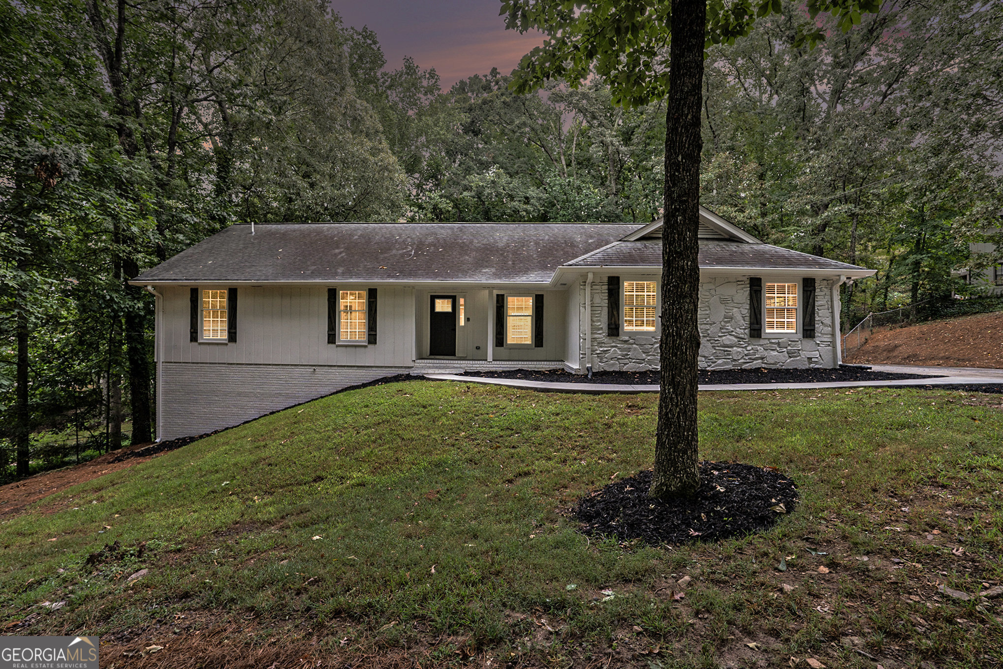 Welcome to 610 Pine Grove Road in the heart of Roswell! This beautifully remodeled home offers the perfect blend of comfort, functionality, and style. The main level showcases an open-concept floor plan with a stunning kitchen featuring white cabinetry, new stainless steel appliances, and plenty of natural light. You'll find 3 spacious bedrooms and 2 full baths upstairs, while the fully finished lower level adds incredible versatility with 3 additional bedrooms and 1 full bath-ideal for guests, extended family, or a private home office. Step outside to enjoy a wonderful patio overlooking a sparkling pool, perfect for relaxing or entertaining. Nestled in a prime Roswell location, this home combines upgraded living with unbeatable convenience to shopping, dining, schools, and parks.
