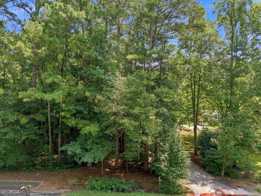 Photo of 13405 Cogburn Road, Milton, GA 30004 (MLS # 10825621)