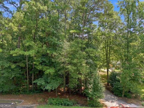 Photo of 13405 Cogburn Road, Milton, GA 30004 (MLS # 10825621)
