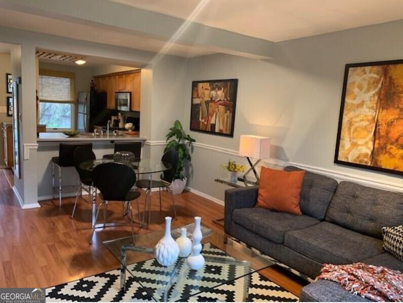 Modern Comfort Meets Prime Location! Step into this beautifully upgraded townhome featuring a bright, open-concept layout, a finished basement for extra living space, and a premium washer and dryer for your convenience. Enjoy your own private, shaded backyard-perfect for relaxing or hosting friends-plus easy access to scenic walking trails. Ideally situated just minutes from Emory, Agnes Scott, CDC, Avondale Estates, the Waldorf School of Atlanta, and some of the area's best restaurants and shopping hotspots. This home offers the perfect balance of style, comfort, and location. Schedule your showing today-this one won't last long!