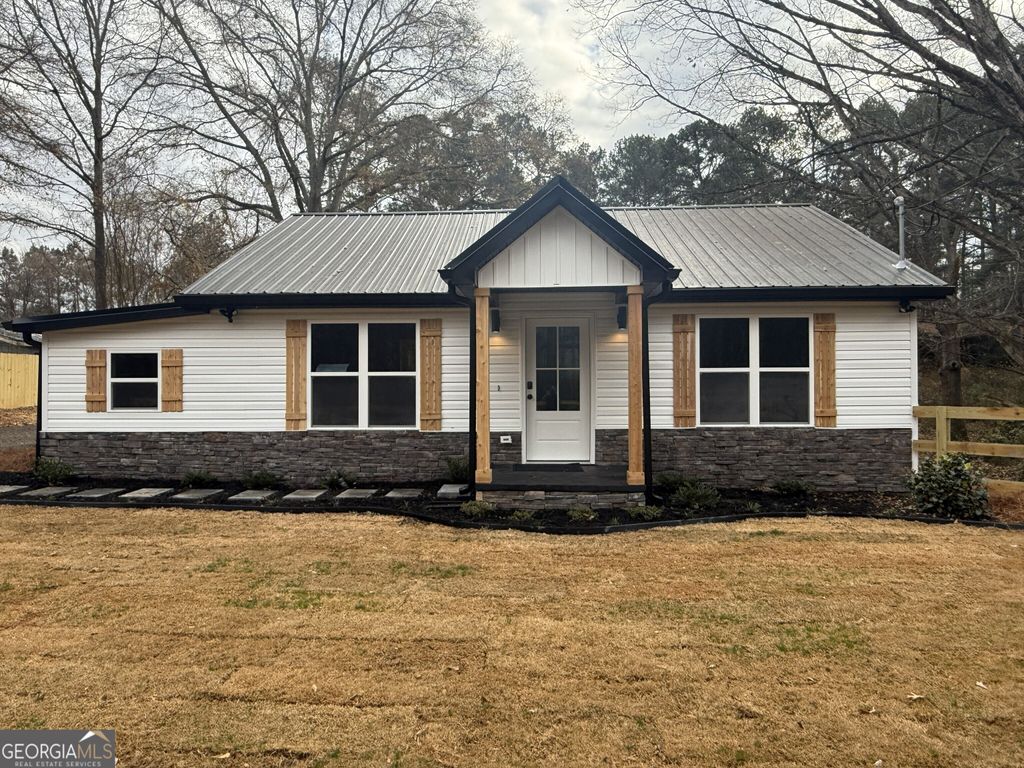 Photo of 7167 Brown Bridge Road, Covington, GA 30014 (MLS # 10664839)