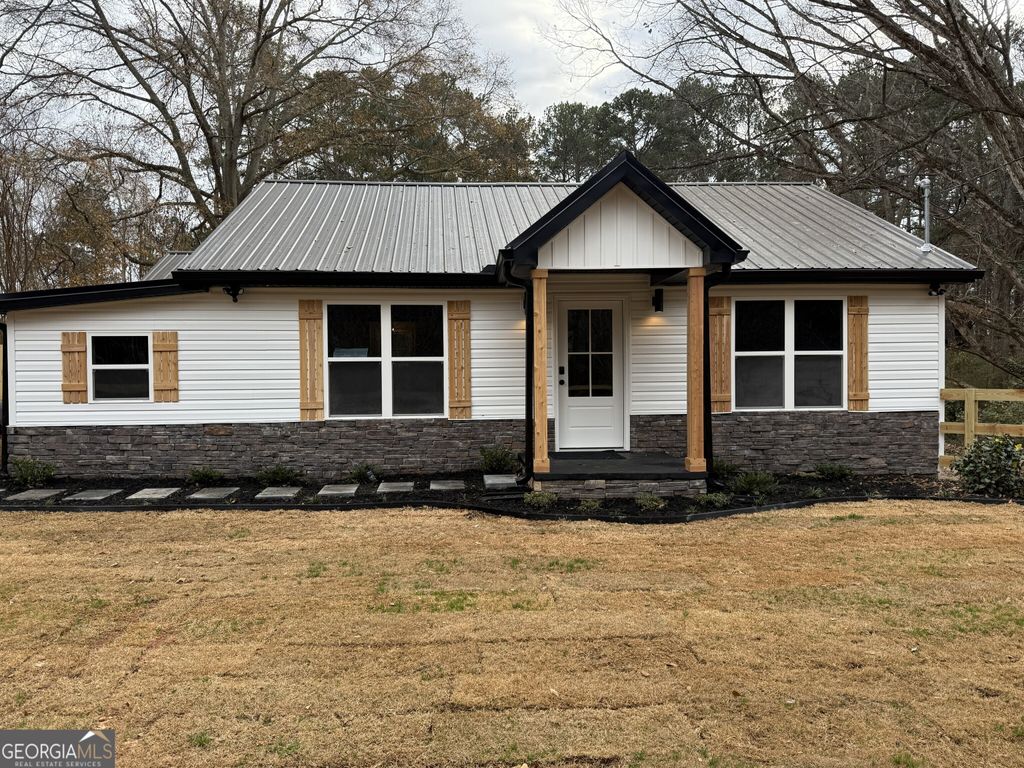 Photo of 7167 Brown Bridge Road, Covington, GA 30014 (MLS # 10664839)