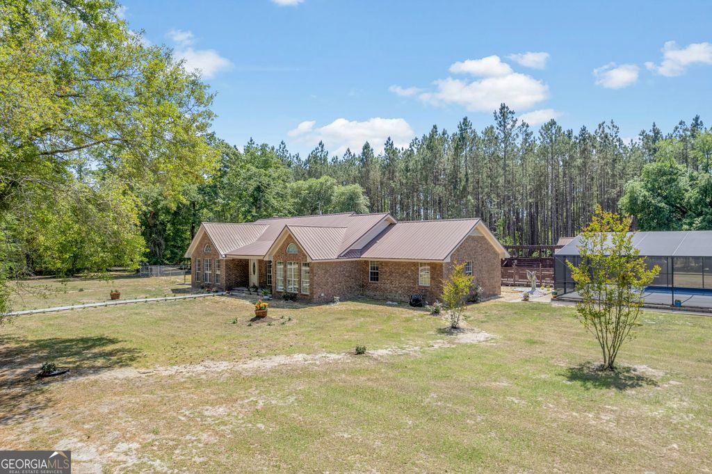 Photo of 1153 Jake Lucas Road NE, Ludowici, GA 31316 (MLS # 10756050)