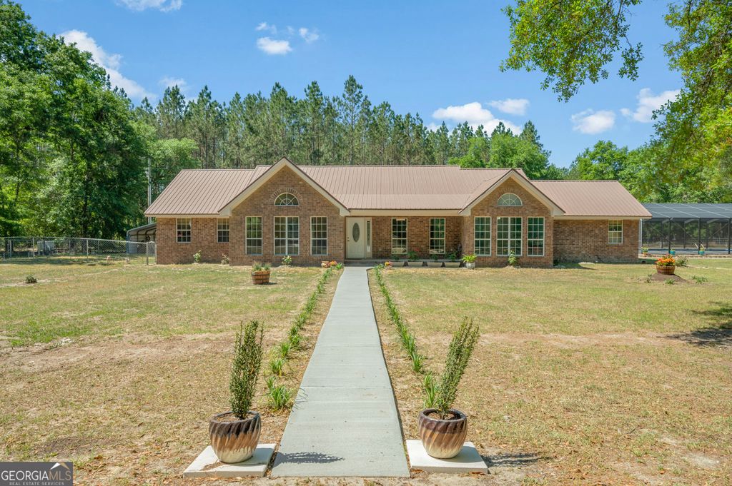 Photo of 1153 Jake Lucas Road NE, Ludowici, GA 31316 (MLS # 10756050)