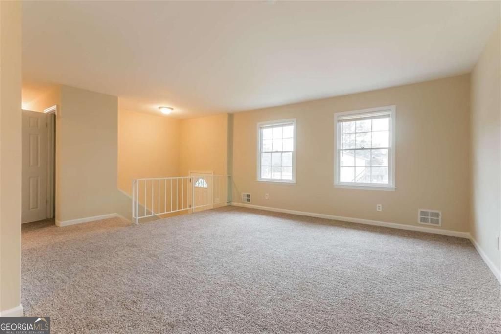 Photo of 6370 Ashdale Drive, Atlanta, GA 30349 (MLS # 10723165)