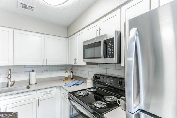 1067 PITTS RD # 1076, ATLANTA, GA 30350 - Image 64f59e054a9ea5f4151fc06e5153138e/2400907753