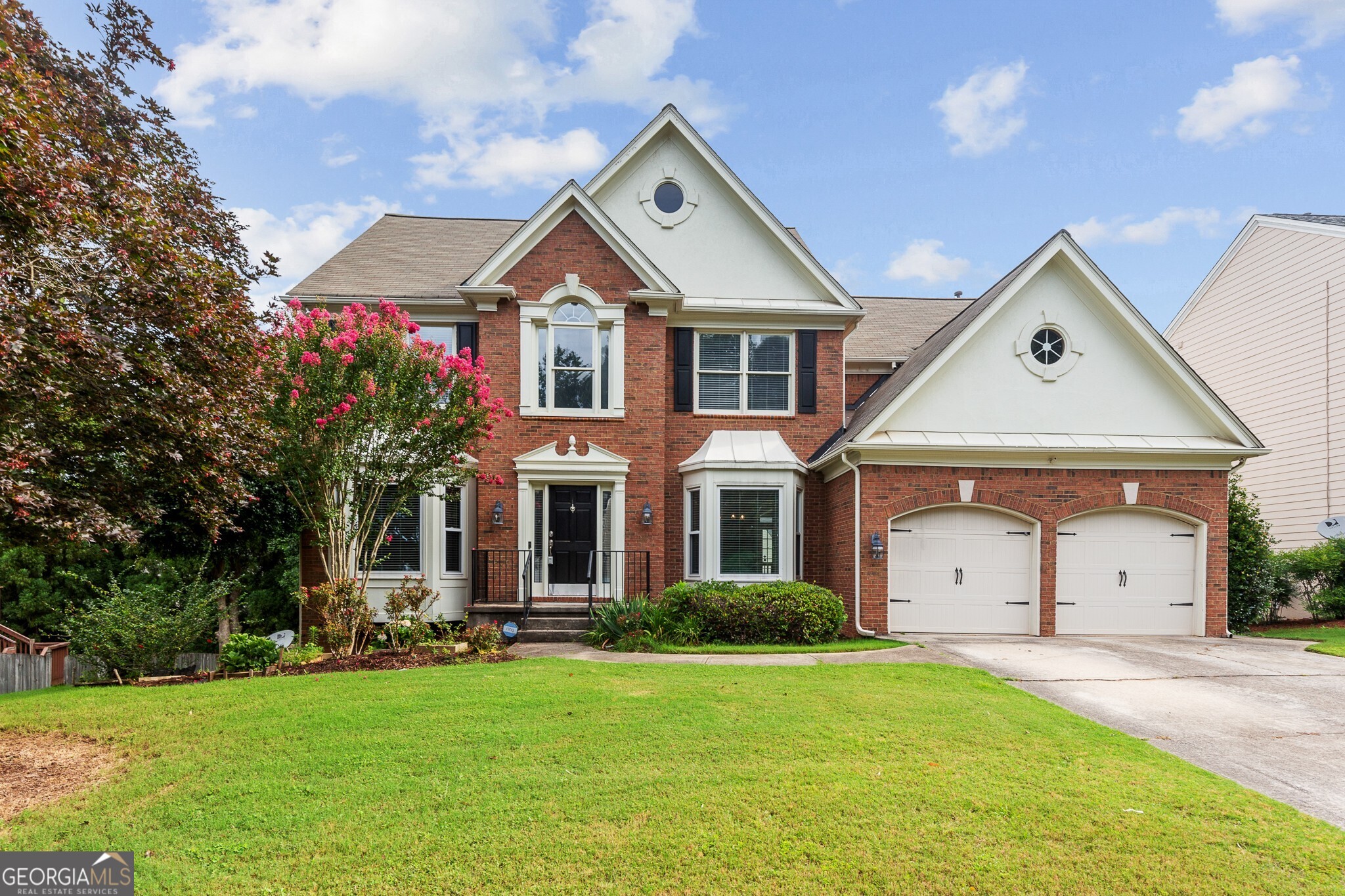 STUNNING 5 BR/3.5 BA Traditional in Dunwoody in a Great School District! This gorgeous home features elegant touches such as hardwood floors, granite countertops, custom shelving, designer paint colors, and more! Grand Foyer entrance with Separate dining room and living room. The Large kitchen open to the family room with a pass-through fireplace to a cozy office. Upstairs is a spacious master with a bright ensuite bath. Three additional bedrooms and full bath. The Terrace level is exceptional with additional living space offering a custom Bar great for entertaining, Media Room, Spacious Recreation/Living Room, Bedroom, and full Bathroom! Enjoy evenings on the back deck. Fenced in back yard and Landscaping maintenance is included! Conveniently located near I-285, 400, shopping, restaurants, and more! Pets allowed, please call for restrictions. **Additional $40.00 per month Resident Benefit Package includes insurance and more!