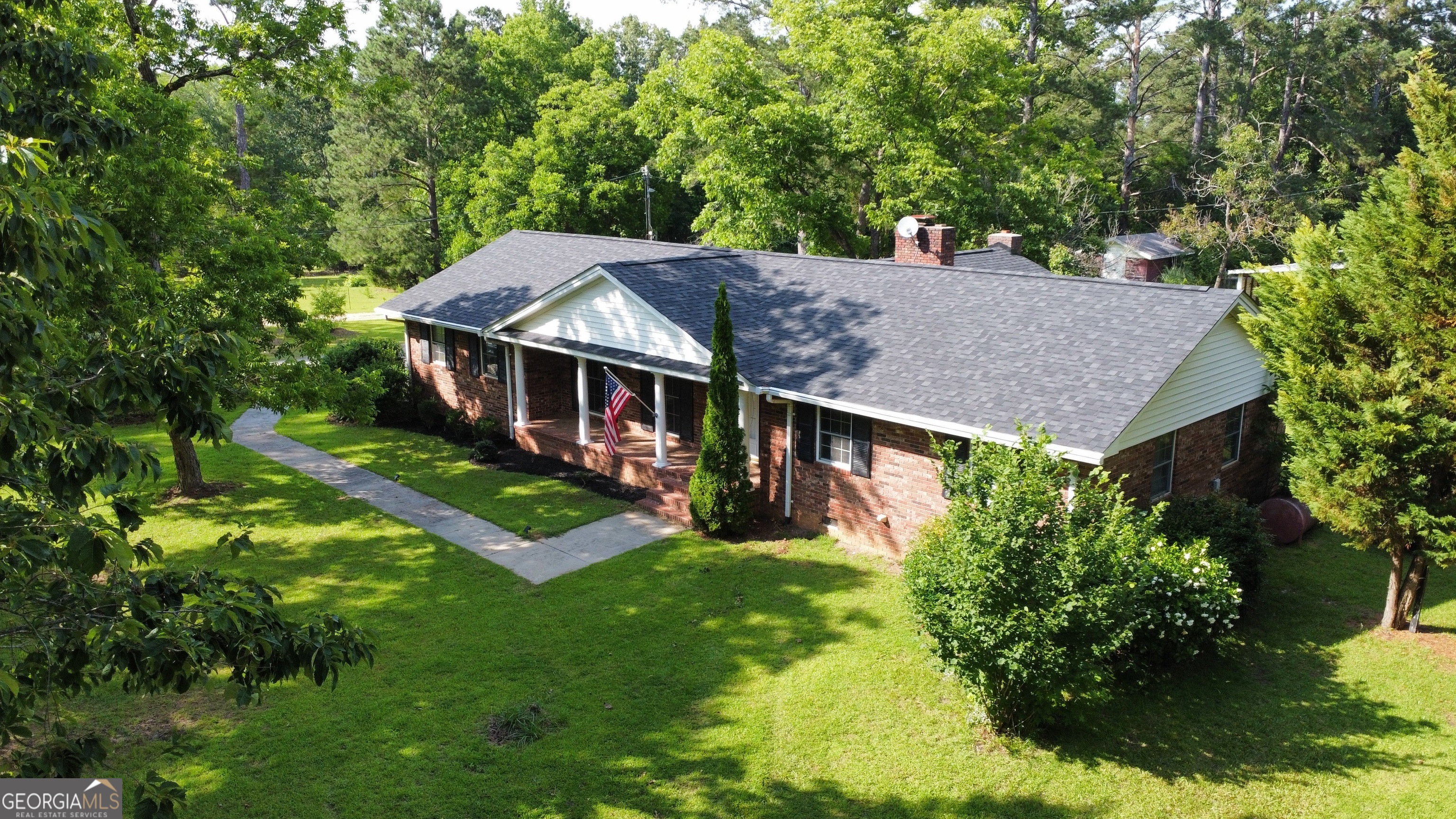 Coming Soon! (more pictures will be posted) "Timeless and Country-style living nestled on 6+ peaceful acres in one of GA's most historic small towns. If you're looking to put down roots where life moves to the rhythm of a slower pace? Welcome Home! This freshly painted 3 bedroom 2 bath offers peace of mind with its New Roof -transferable Warranty and classic all brick solid construction, while the beautiful surrounding acreage gives you room to roam or simply enjoy the beauty of nature with mature flowers, pecan and fruit trees full of apples, pears, persimmons, figs and mulberries. Out back, you'll find a 41x31 old block storage building with attached lean-tos currently used to store a boat, tractor, and truck but full of potential~ workshop, hobby space or barn to store chicken, goat and horse feed; let your imagination take the lead. Beyond that, there's a clear trail that leads to the back of the property perfect for hunting, exploring, or simply enjoying the outdoors. Be sure to check out the locally loved spots like The Nest' coffee shop, the nostalgic ice cream parlor and Maddy's pub. The kind of places that give Washington its warm, timeless town charm. For more information or to schedule a showing call Luvee 404-698-7910