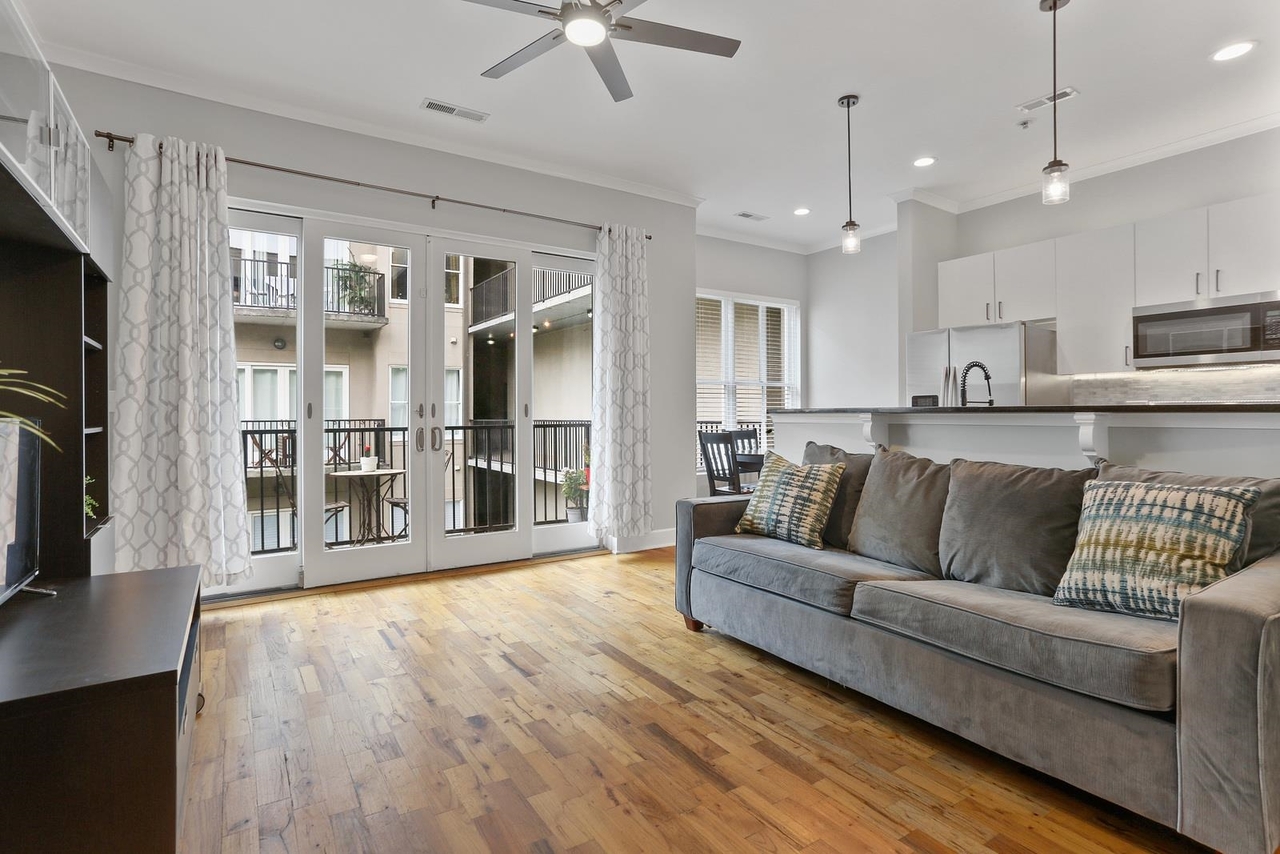 This stylish, one-owner condo is freshly updated throughout. The unit features 10-ft ceilings, marble backsplash, smart thermostat, new fixtures and hardware, a closet system, and oversized windows that fill the space with natural light. **This condo will convey with a storage unit – fantastic added value for intown living.** The building features a concierge, covered parking, saltwater pool, gym, clubhouse, and green space for pets. HOA fee covers the homeowners’ cable, internet/wifi, gas, water/sewer, and trash. The vibrant Old 4th Ward location is bike-friendly and walkable. Less than 1 mile to Ponce City Market, the Beltline, Krog Street Market, MLK Center, the iconic Jackson Street Bridge, and a proposed multi-billion dollar initiative that includes the former Civic Center. Quick ride to the airport and MARTA stops on the corner.