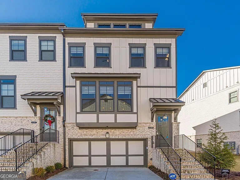 Welcome to Dumont Place Townhomes, a gem nestled in the heart of Decatur, GA. This stunning 3-bedroom, 3.5-bathroom home is a perfect blend of luxury and comfort. The open concept floorplan is accentuated by 10-foot ceilings and hardwood floors throughout, creating a spacious and inviting atmosphere. The open kitchen is a chef's dream, boasting a large island, stainless steel appliances, an oversized pantry, and quartz countertops. The family room, complete with a cozy fireplace, is perfect for entertaining or simply relaxing. The owner's suite is a private retreat, featuring a sitting room for added comfort. An additional Au Pair or InLaw suite provides extra space and flexibility. This home also includes a built-in wine bar, perfect for those who appreciate a good vintage. The community offers a swimming pool for leisurely days and a walking trail for those who enjoy an active lifestyle. With its prime Druid Hills location, this home is a perfect blend of convenience and luxury. Experience the best of Decatur living.