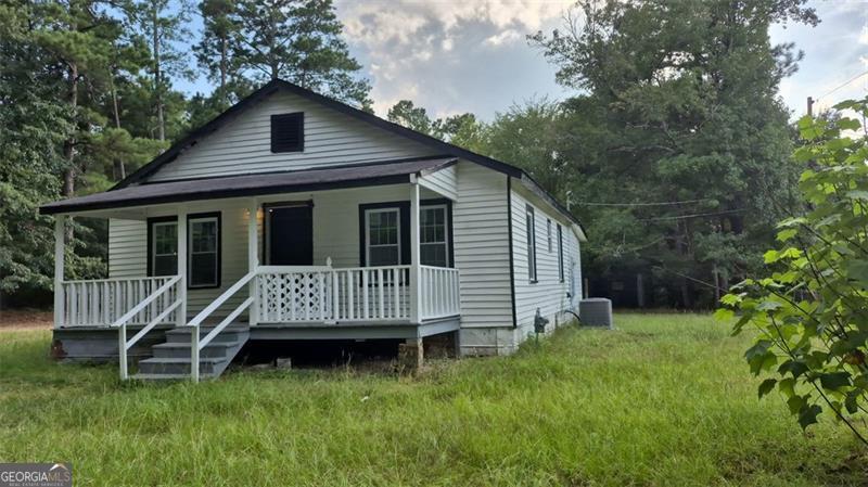 Fully renovated and move-in ready, this charming 3-bedroom, 1-bathroom home offers approximately 1,064 sq. ft. of living space on a spacious 1.3-acre lot. Recently renovated, giving you peace of mind for years to come. Inside, every detail has been refreshed to provide modern comfort while maintaining a warm, inviting feel. With its generous lot size, there's plenty of room for outdoor activities, gardening, or future expansion.