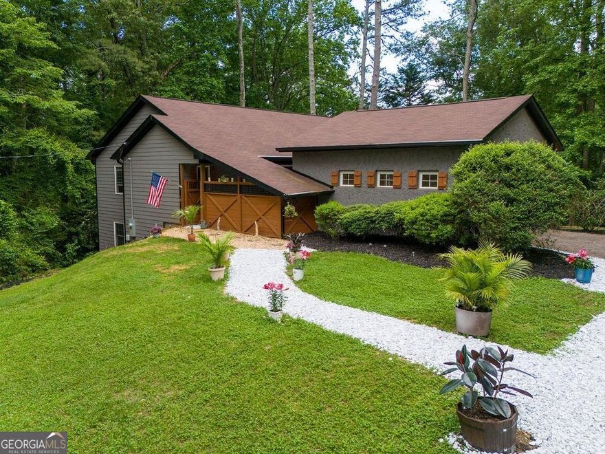 East Cobb Gem about to hit the market in the middle of May. This beautifully rebuilt 3 bedroom, 2 bath ranch on full unfinished basement is about to wow your socks off. It is in the heart of East Cobb close by I-75. The trifecta of schools Murdock, Dodgen, Walton. A rare find that blends charm, convenience, and modern upgrades. Inside you will find a spacious open concept layout designed for entertaining. The bright and airy living space flows seamlessly. It was fully rebuilt from the ground up just 4 years ago. The full unfinished basement is stubbed for a bathroom and walks right out into a large wooded yard. The front courtyard is your own private escape. Drink your morning coffee or your evening wine with only the sounds of nature. This is an excellent property for anyone looking to get into the best East Cobb schools! Move in ready! Roof, windows, HVAC, water heater, appliances are all 3-4 years old.