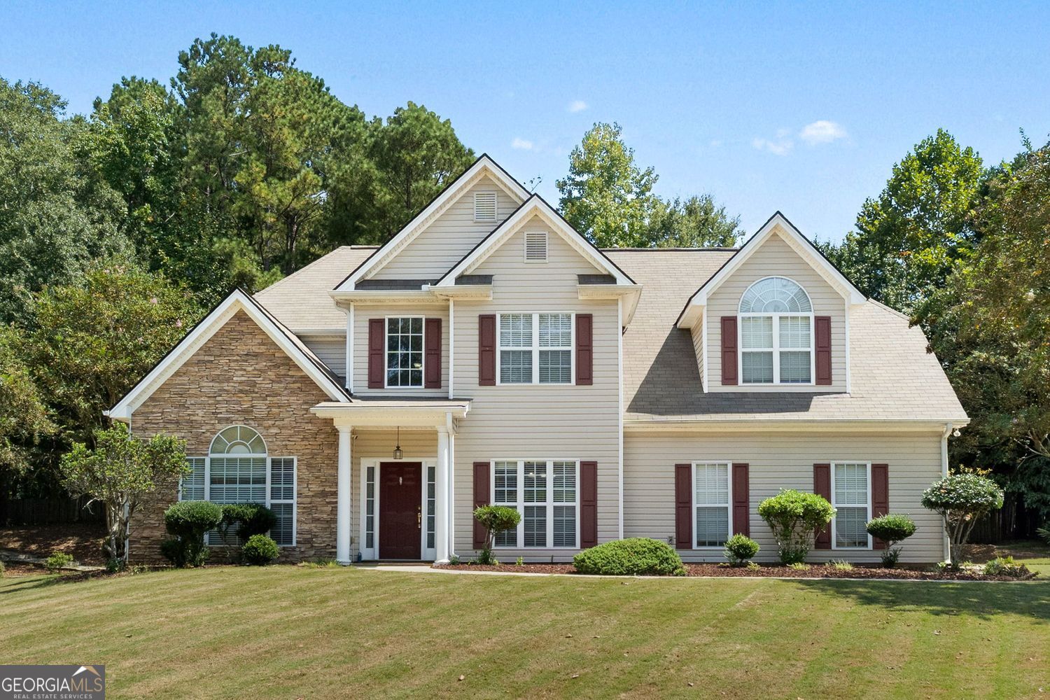 Pride of ownership shows in this lovingly maintained home situated on a quiet cul-de-sac in a beautiful community convenient to Fayetteville, Peachtree City and Trilith. The striking curb appeal welcomes you into the 2-story foyer flanked by a formal dining room and leading to the open kitchen and living area. An abundance of light flows through large windows in the charming family room and breakfast room providing a sunny atmosphere with a view of the backyard. The family room also features a volume ceiling and fireplace. The bright kitchen features granite countertops, stainless steel appliances and a breakfast bar open to the informal dining area. The owner's suite is conveniently located on the main level as is a half bath perfect for guests. On the upper level there are four more bedrooms and two baths. Two bedrooms share a jack-n-jill bath while the other two bedrooms share the hall bath. A newer roof, air conditioner, water heater, and dishwasher are some of the more recent updates to this meticulously maintained home. Ample parking for homeowners and guests alike is provided with a 2-car side-entry garage with large turnaround area and driveway. A garden shed is tucked in the corner of the backyard for your extra storage needs. Neighborhood amenities include pool, tennis, pickleball, basketball, playground and a walking path which connects to nearby schools and surrounding area. Schedule your tour today to claim this wonderful home in a great community in the heart of Fayette County.