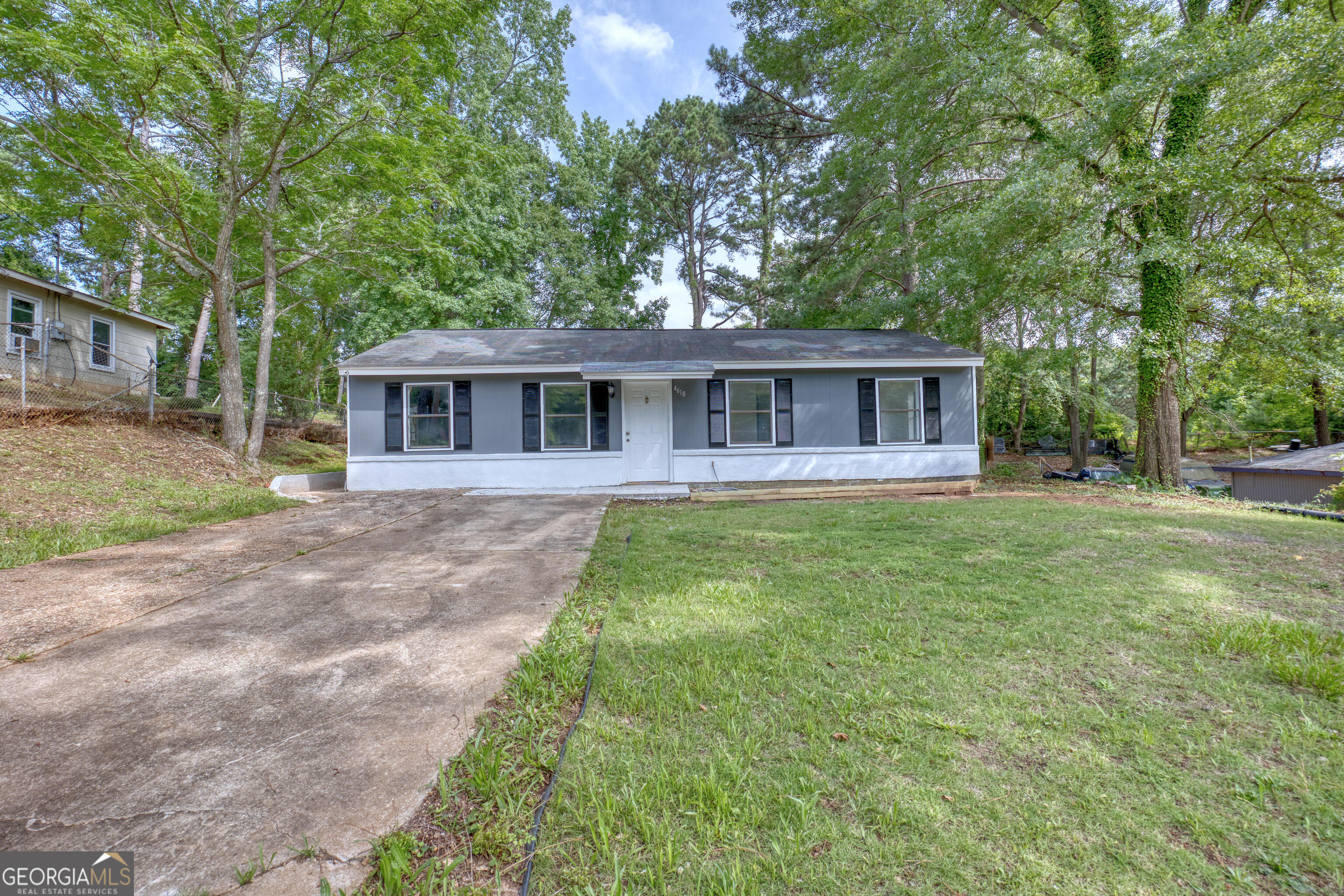 Step into this beautifully renovated 4-bedroom, 2-bathroom home that perfectly blends modern elegance with everyday comfort. Recently updated with tile flooring, a bright open concept living area, and a sophisticated color palette that creates a warm and welcoming atmosphere the moment you walk in. Enjoy a stunning, newly renovated kitchen featuring sleek white cabinetry, high-end finishes, beautiful countertops, an induction stove and stainless-steel appliances perfect for creating family meals and entertaining guests. Each bedroom is generously sized with plenty of natural light, and the newly added walk-in closet in the primary suite adds a touch of luxury and convenience. Relax on the cozy porch, store your tools and hobbies in the private shed, and enjoy the spacious yard an ideal space for gatherings or quiet mornings with coffee. This home features a brand-new HVAC system for year-round comfort, updated bathrooms and modern fixtures throughout. Just minutes from Fort Benning, making it perfect for military families, and close to restaurants, shopping, and local amenities.