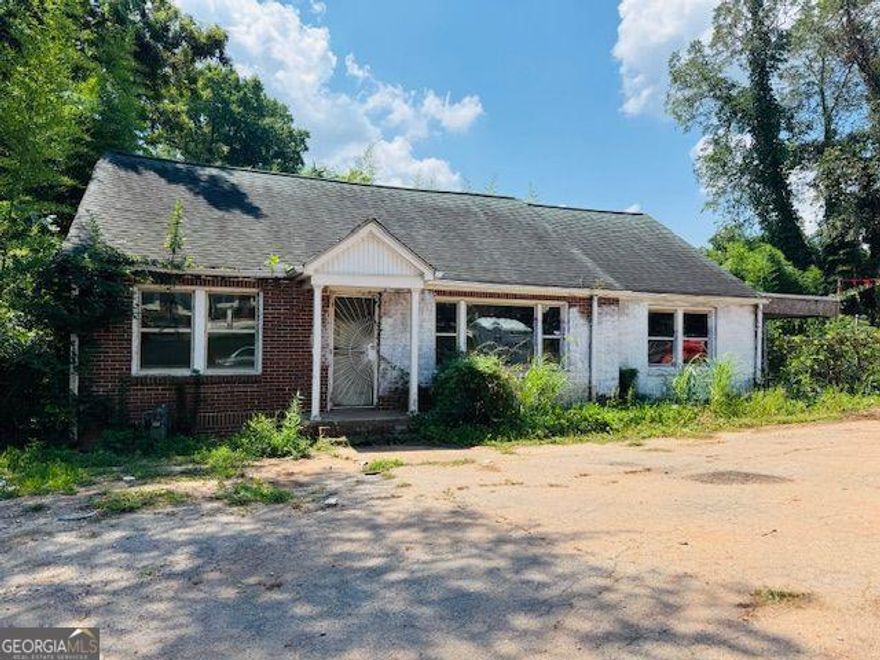 This is a great opportunity to own commercial building in a popular location. Price also includes the vacant lot next door (3009 Memorial Drive - parcel  15-183-24-027).  The property is zoned  C-1. Contact the listing agent for more details and for access.