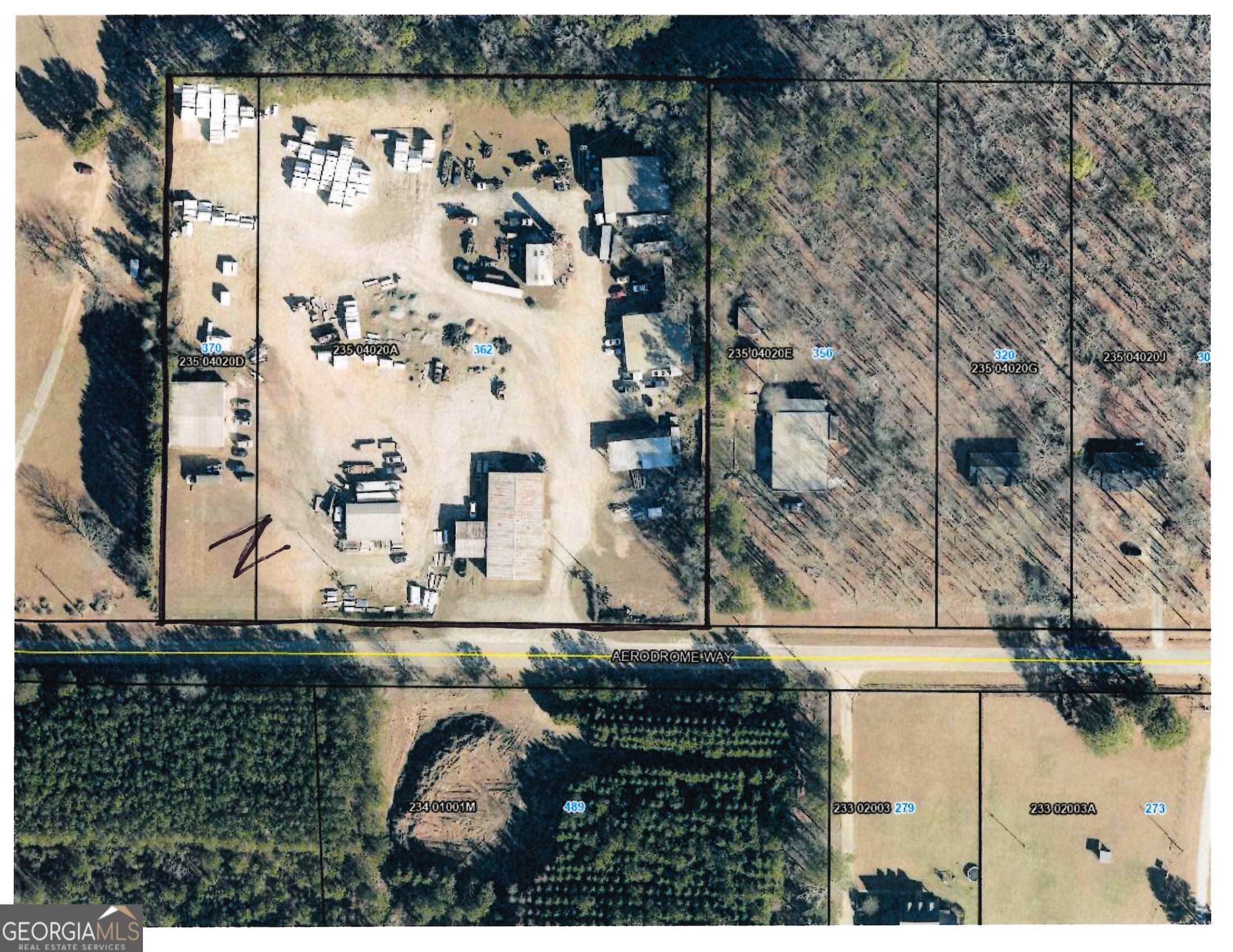 FIVE BUILDING COMPLEX ON 5.8 ACRES SUITABLE FOR HEAVY EQUIPMENT, LUMBER AND TRUCKING. ALL 5 BUILDINGS ARE RENTED $9740/MONTH. NICE INCOME PRODUCING INVESTMENT.