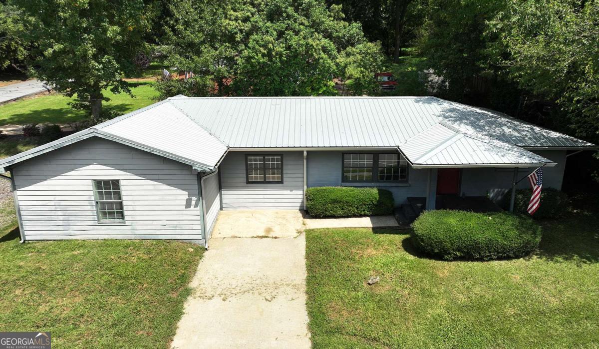 Discover an exceptional opportunity to own this revitalized 3 bedroom , 2 bath ranch-style home with so many possibilities! Whether you're looking for your new home, game day Airbnb, or rental investment, the location is hard to beat - only a few minutes away from the UGA campus and situated right along the Transit 27 bus route for direct access to Walmart and other Athens amenities! The home features updated bathrooms and flooring, with a nicely sized living room and dining area. With the driveway as well as a parking area along the side of the home, you'll have no problem finding parking when looking to entertain guests! Book your appointment today!