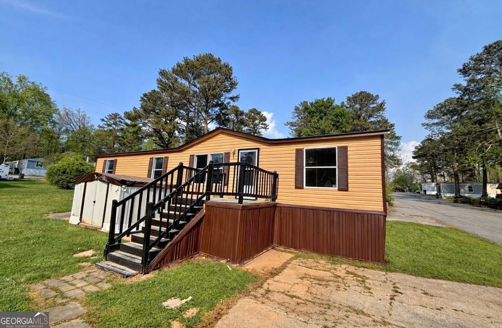 Photo of 17 Club Circle, Ellenwood, GA 30294 (MLS # 10766421)
