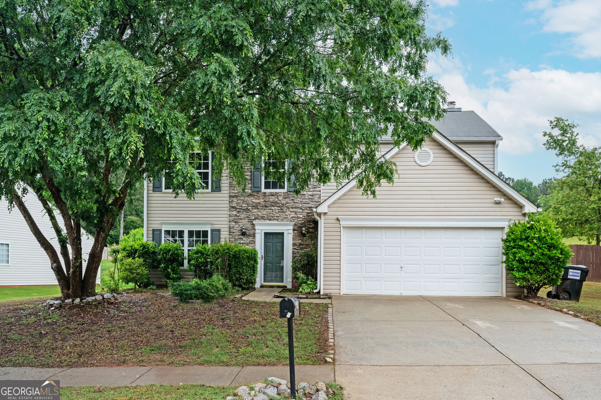 ** HUGE PRICE IMPROVEMENT** Welcome to your dream home! This stunning 3-bedroom, 2.5-bath renovated gem is a perfect blend of modern luxury and timeless charm. Every inch of this home dazzles with designer finishes, including elegant quartz countertops, new flooring, fresh paint, and brand-new stainless steel appliances. The main level hosts an updated kitchen with views to the family room featuring a fireplace framed by custom built-in bookshelves and cabinetry, half bath, and separate dining room. French doors open to the patio and large backyard, ideal for entertaining or unwinding. Upstairs, the primary suite now shines with an updated en-suite bath and walk-in closet equipped with an organization system inclusive of shelving, expandable hang rods, and drawers to make organization a breeze. Two additional bedrooms provide plenty of space for family, guests, or a home office. The laundry room completes the upper level. Nestled in the sidewalk-lined Deer Valley community, this home is conveniently located near shopping, dining, and some of Cobb county's top-rated schools. Your dream home awaits! Sold as-is!