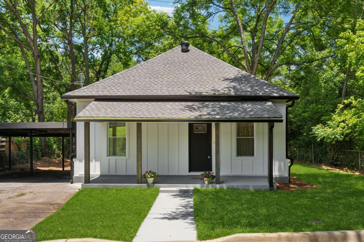 Just Minutes from Historic Marietta Square welcome to your next home. Luxury Living nestled in a peaceful neighborhood just minutes from the vibrant charm of Marietta Square, this home offers the perfect blend of location, lifestyle, and luxury. This fully renovated masterpiece has been impeccably reimagined to welcome home a new owner! No detail has been overlooked sep inside to discover a home filled with premium upgrades. The all-new kitchen is a true focal point, featuring striking cabinetry, quartz countertops, and sleek stainless steel appliances - ideal for entertaining and everyday living. A spacious primary bathroom offers an expansive tiled shower and luxurious finishes. Enjoy serene outdoor living on the covered front patio, overlooking your beautiful landscaped front yard. With easy access to the shopping, dining, and entertainment near Marietta Square, this home offers both tranquility and convenience. Truly move-in ready - luxury, comfort, and location all in one. This home is waiting for you to make it yours!